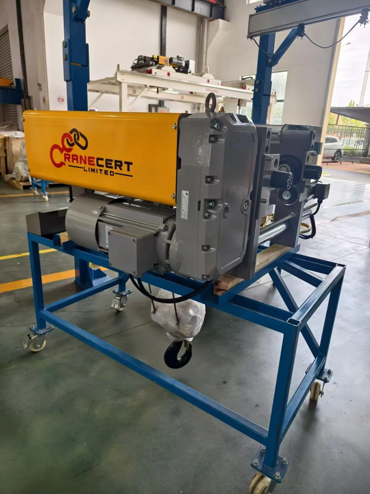 CraneCert-branded hoist motor and gearbox prepared in the workshop